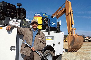 The Case service truck next to a Case excavator