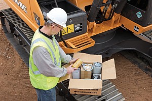 Changing the oil filter on a Case dozer